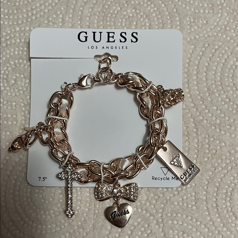 Guess Gold-Tone Charm Bracelet with Sparkling Accents